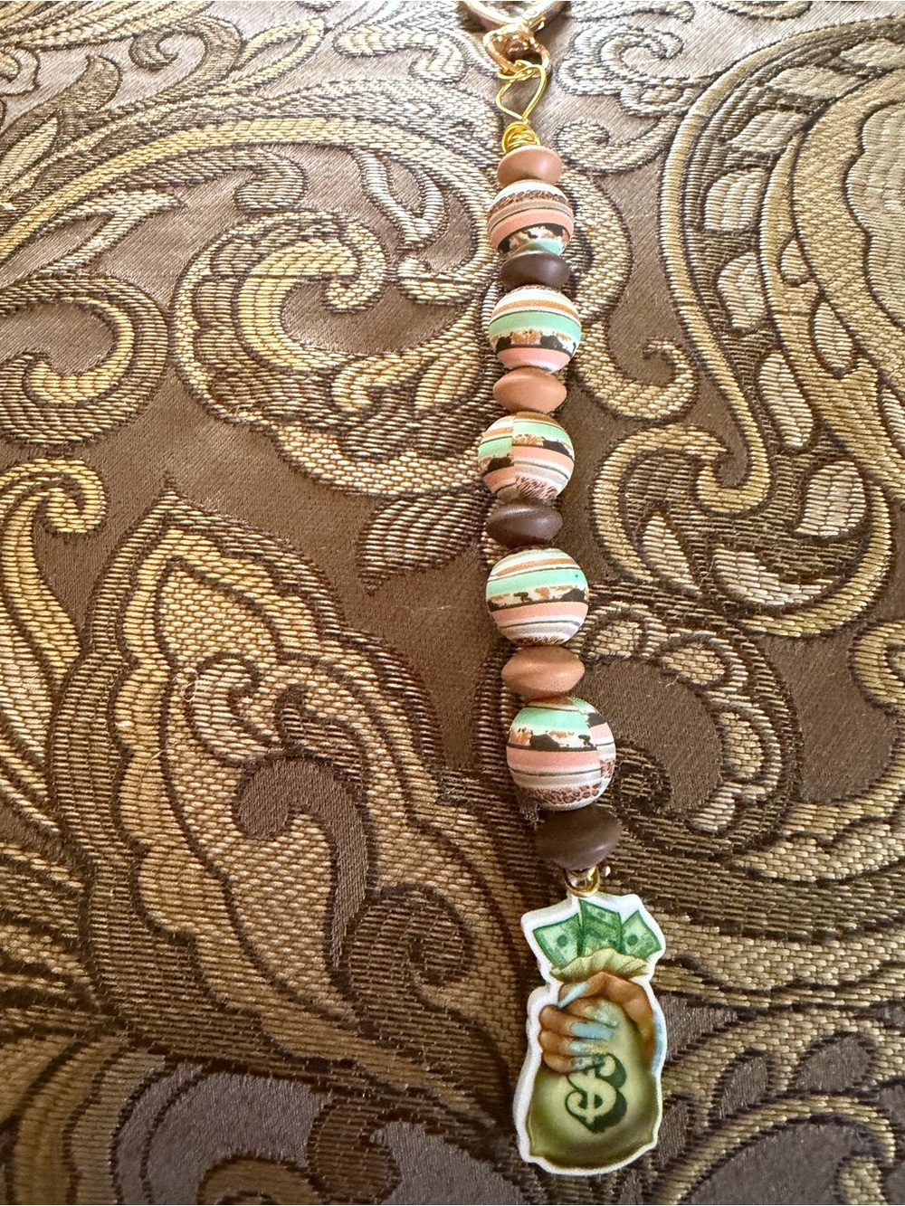 Striped Bead Necklace with Money Bag Charm in Brown, Mint & Peach